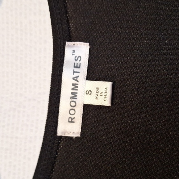 Black small blouse with ruffle bottom. - Picture 3 of 5